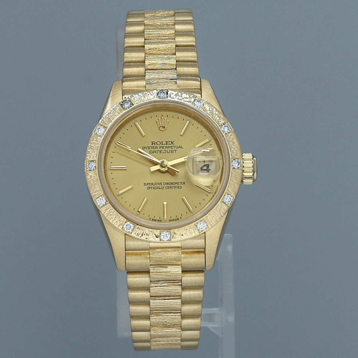 MINT Ladies Rolex DateJust Bark Finish President 26mm 69288 Gold Diamond Bezel Watch