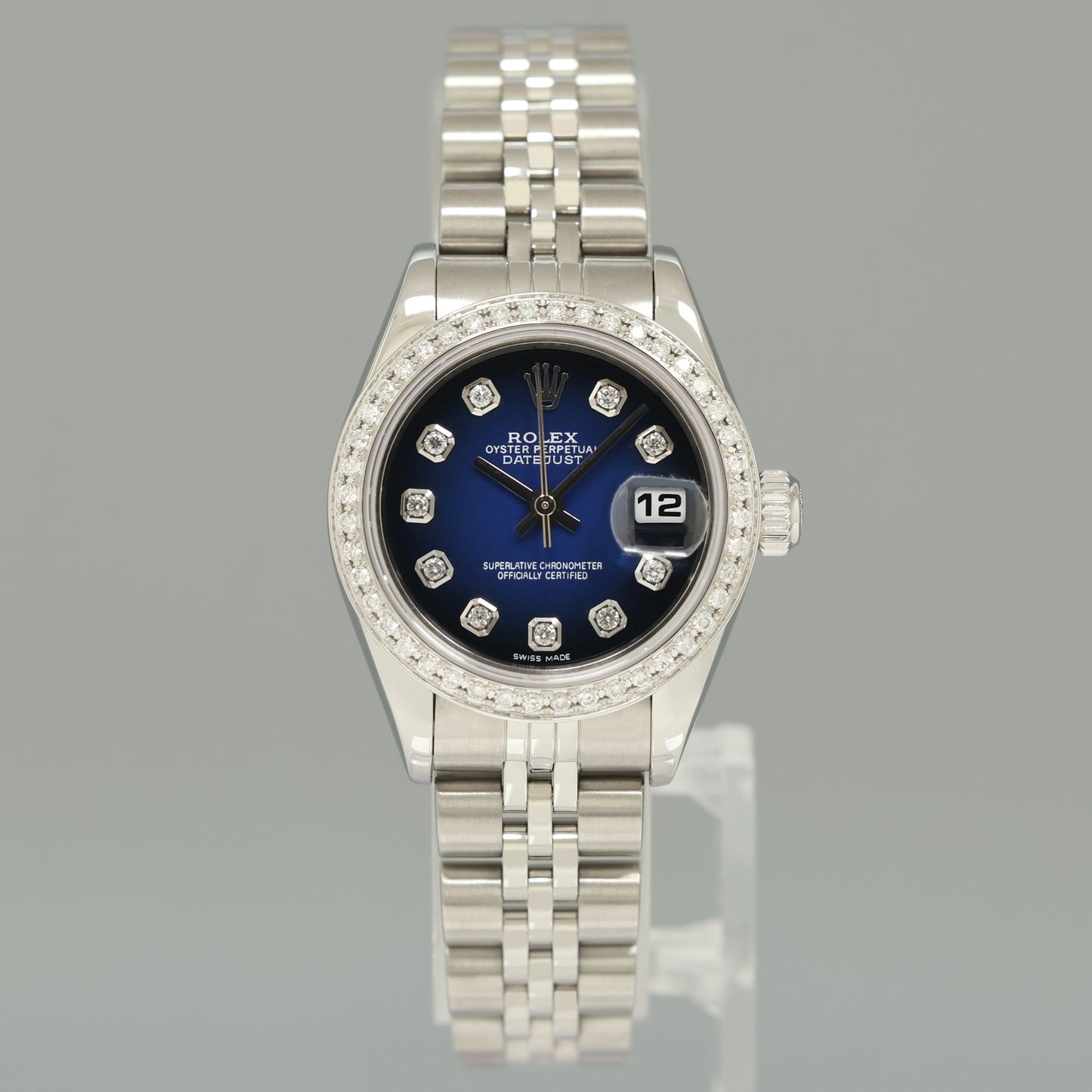 MINT Ladies Rolex 79174 DateJust 26mm Silver Blue Vignette Diamond Bezel Jubilee Watch