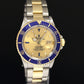 Rolex Submariner Date 16803 Two-Tone Gold Champagne Serti Sapphire Blue 40mm Watch