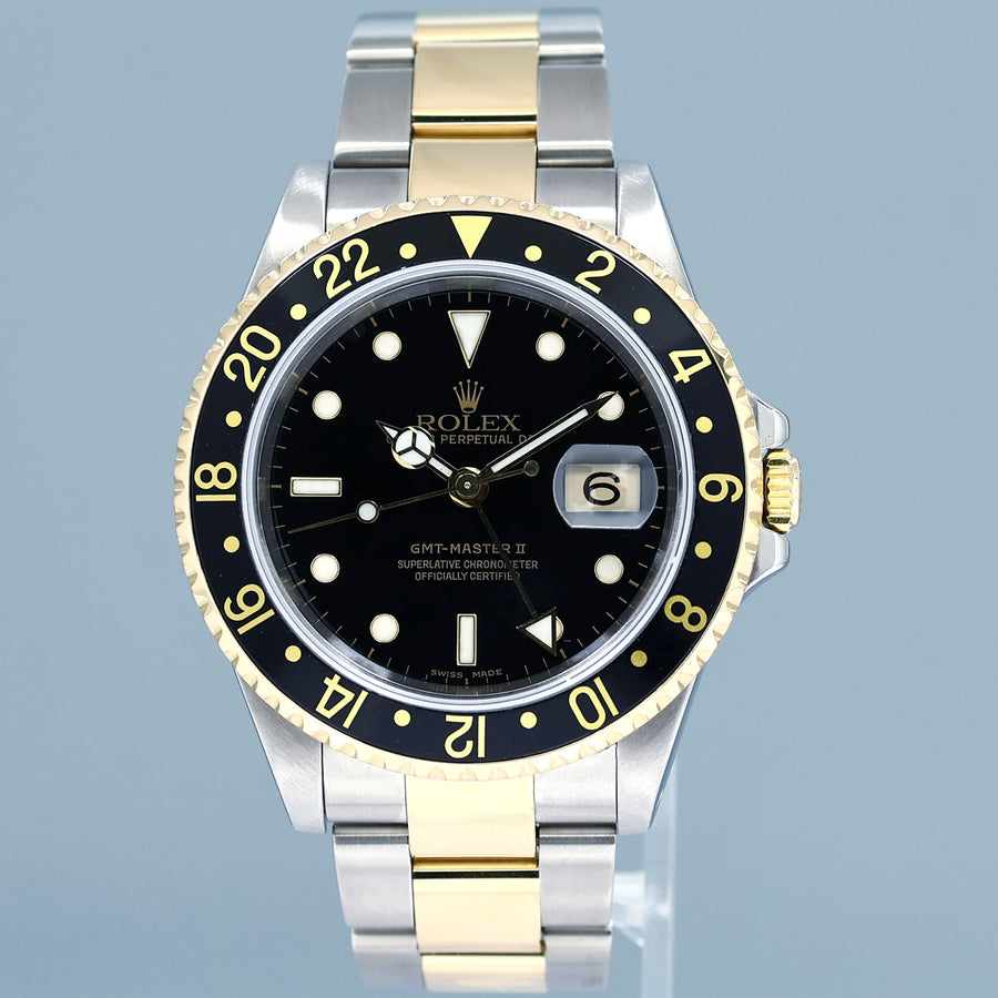 2000 PAPERS MINT Rolex GMT-Master II 16713 Black Two-Tone Yellow Gold Steel Watch