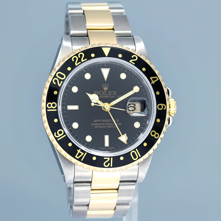 2000 PAPERS MINT Rolex GMT-Master II 16713 Black Two-Tone Yellow Gold Steel Watch