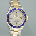 MINT Rolex Submariner 16613LB Two Tone Gold Silver Serti Diamond Watch