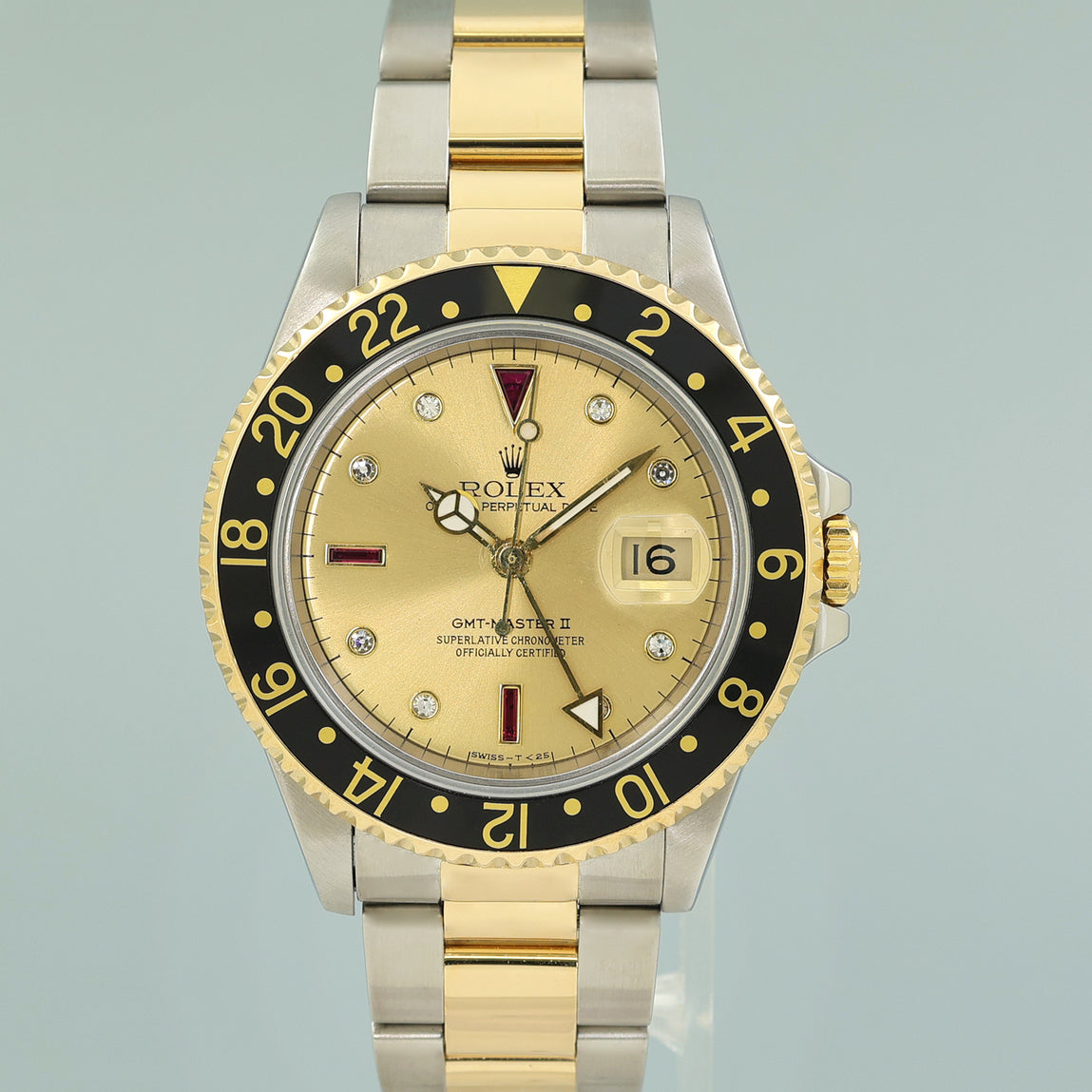 Rolex GMT-Master 16713 Two-Tone Yellow Gold Champagne Serti Ruby