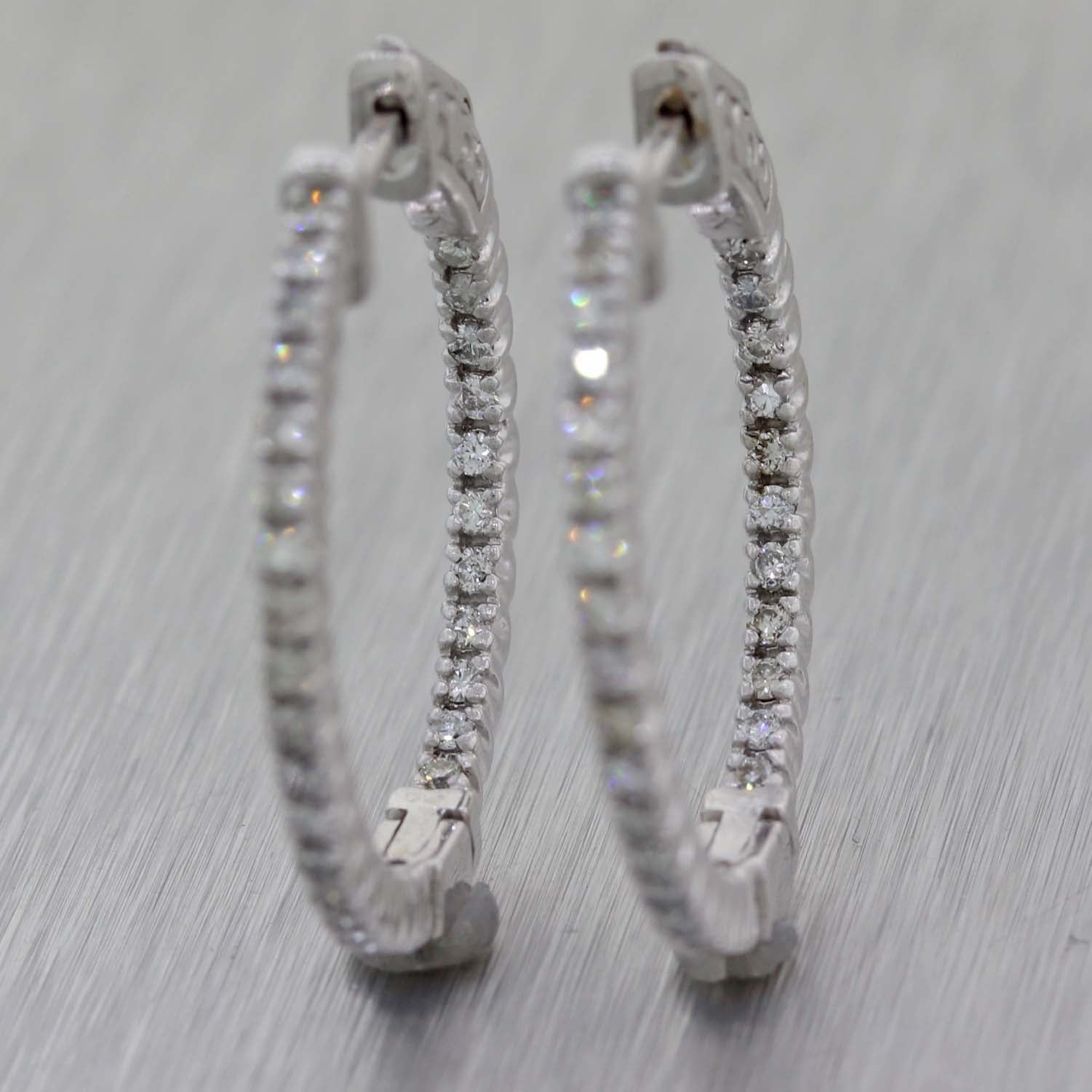 Ladies 14K White Gold .71ctw Diamond 2mm In-Out Hoop Earrings