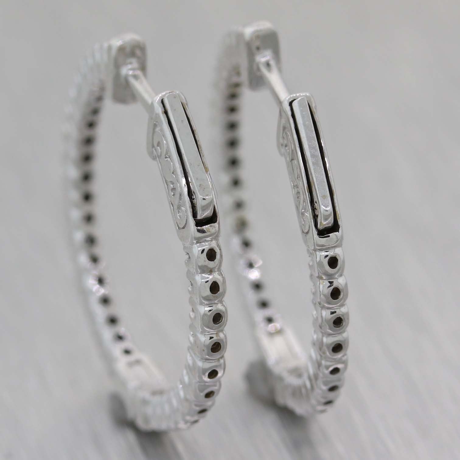 Ladies 14K White Gold .71ctw Diamond 2mm In-Out Hoop Earrings